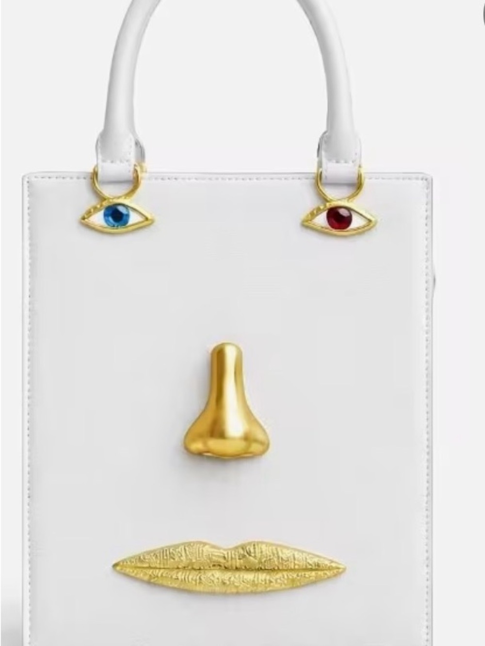 White Crossbody Bag with Gold Facial Hardware and Colored Eye Charms